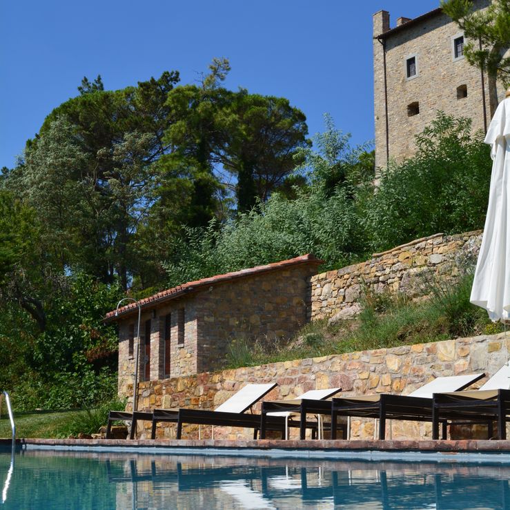 Castello di Montegiove pool and castle